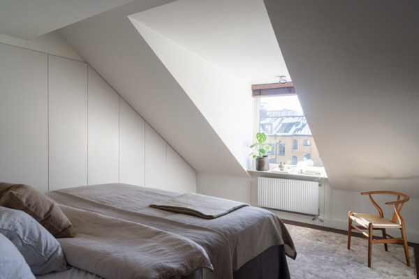 Роскошный интерьер мансардной квартиры в Стокгольме