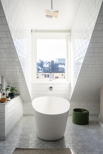 Роскошный интерьер мансардной квартиры в Стокгольме