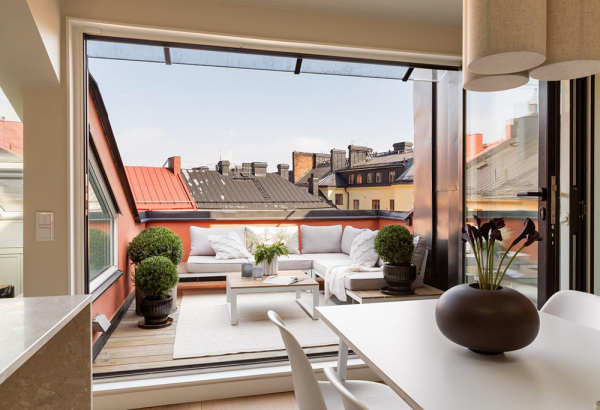 Мягкий минимализм под крышей: мансардная квартира в Стокгольме