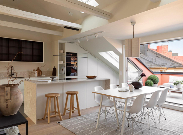 Мягкий минимализм под крышей: мансардная квартира в Стокгольме