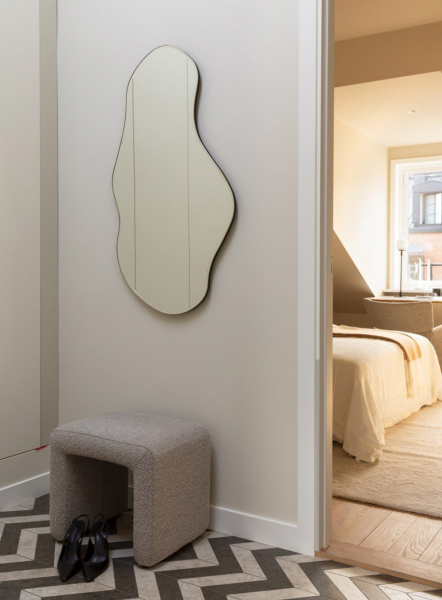 Мягкий минимализм под крышей: мансардная квартира в Стокгольме