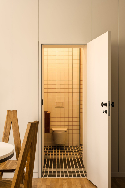 Строгий элегантный дизайн небольшой квартиры в модернистском доме в Варшаве (55 кв. м)