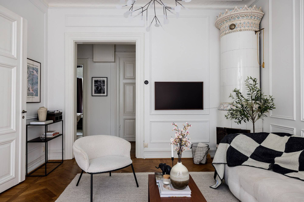 Белая, элегантная, с камином: квартира в Мальмё (75 кв. м) Белая, элегантная, с камином: квартира в Мальмё (75 кв. м)