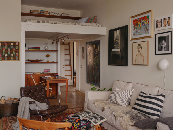 Чудесные виды на город через арочные окна: уютная квартира в Стокгольме