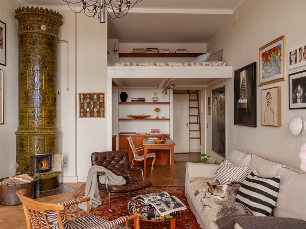 Чудесные виды на город через арочные окна: уютная квартира в Стокгольме