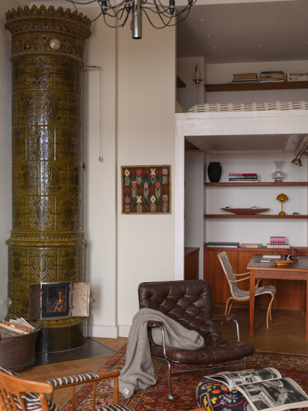 Чудесные виды на город через арочные окна: уютная квартира в Стокгольме