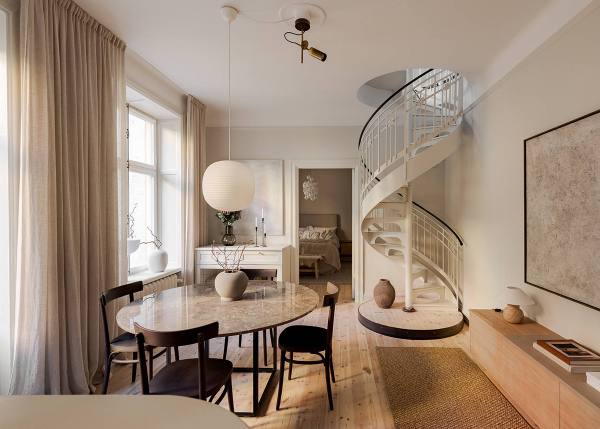 Два уровня и спиральная лестница: квартира с мансардой в Стокгольме