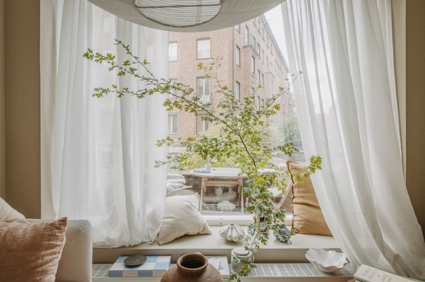 Маленькая квартира в Швеции с удлинённой планировкой и небольшой террасой (38 кв. м)