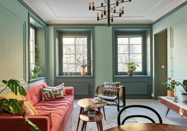 Маленькая угловая квартира в интересных оттенках зелёного в Стокгольме (50 кв. м)