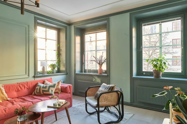 Маленькая угловая квартира в интересных оттенках зелёного в Стокгольме (50 кв. м)