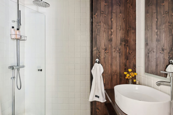 Маленькая угловая квартира в интересных оттенках зелёного в Стокгольме (50 кв. м)