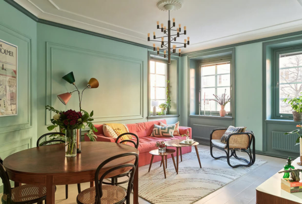 Маленькая угловая квартира в интересных оттенках зелёного в Стокгольме (50 кв. м)