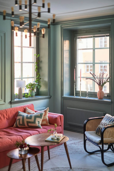 Маленькая угловая квартира в интересных оттенках зелёного в Стокгольме (50 кв. м)