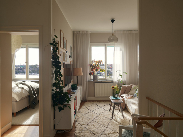 Необычная двухэтажная квартира в Стокгольме с видовой террасой